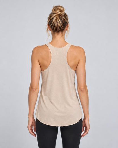 Yoganastix Vanilla Boyfriend Tank on Amy, back view showing racerback and flowing curved hem